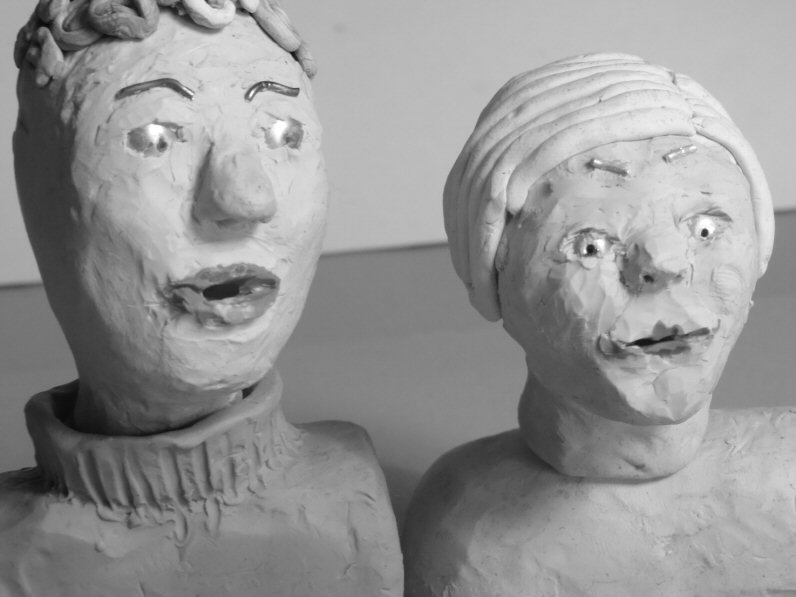 two plasticine heads