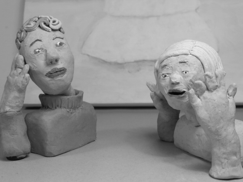 2 plasticine heads