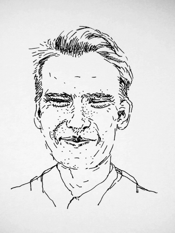 ink drawing of young man with freckles, smiling